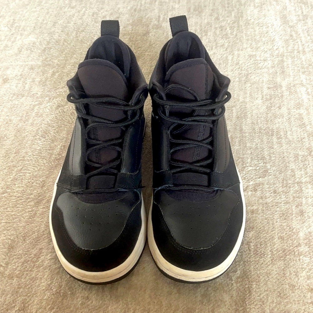 Black high top Jordans. Size 7Y (big boy)